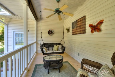 Welcome to this stunning 3-bedroom, 2.5-bathroom waterfront home on Players Course At Wyboo Plantation in South Carolina - for sale on GolfHomes.com, golf home, golf lot
