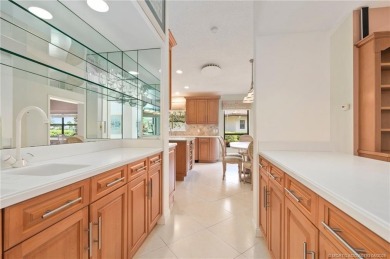 Enjoy natural light and serene views overlooking the lake, pool on Pipers Landing Country Club in Florida - for sale on GolfHomes.com, golf home, golf lot