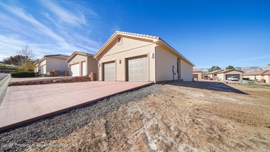 Live easy and play hard at The Villas on Battlement Mesa Golf on Battlement Mesa Golf Course in Colorado - for sale on GolfHomes.com, golf home, golf lot