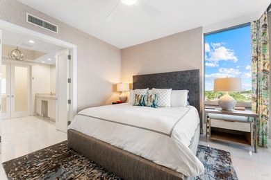 FULLY FURNISHED designer residence at Water Club with on Lost Tree Club in Florida - for sale on GolfHomes.com, golf home, golf lot