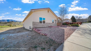 Live easy and play hard at The Villas on Battlement Mesa Golf on Battlement Mesa Golf Course in Colorado - for sale on GolfHomes.com, golf home, golf lot