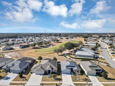 Welcome to a life that feels like vacation every day. Nestled in on Arlington Ridge Golf Club in Florida - for sale on GolfHomes.com, golf home, golf lot