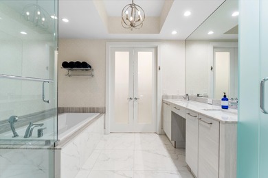 FULLY FURNISHED designer residence at Water Club with on Lost Tree Club in Florida - for sale on GolfHomes.com, golf home, golf lot