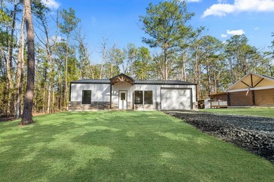 Discover modern East Texas living in this newly constructed on Rayburn Country Club in Texas - for sale on GolfHomes.com, golf home, golf lot