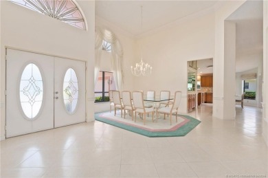Enjoy natural light and serene views overlooking the lake, pool on Pipers Landing Country Club in Florida - for sale on GolfHomes.com, golf home, golf lot