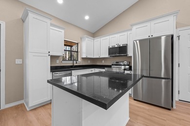 Discover modern East Texas living in this newly constructed on Rayburn Country Club in Texas - for sale on GolfHomes.com, golf home, golf lot