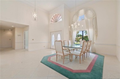 Enjoy natural light and serene views overlooking the lake, pool on Pipers Landing Country Club in Florida - for sale on GolfHomes.com, golf home, golf lot