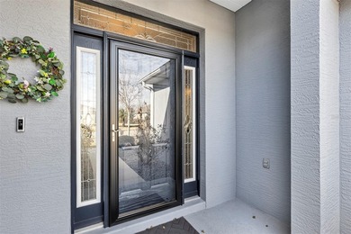 Welcome to a life that feels like vacation every day. Nestled in on Arlington Ridge Golf Club in Florida - for sale on GolfHomes.com, golf home, golf lot