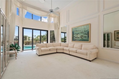 Enjoy natural light and serene views overlooking the lake, pool on Pipers Landing Country Club in Florida - for sale on GolfHomes.com, golf home, golf lot