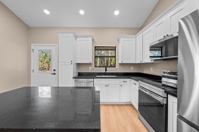 Discover modern East Texas living in this newly constructed on Rayburn Country Club in Texas - for sale on GolfHomes.com, golf home, golf lot