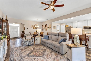 Welcome to a life that feels like vacation every day. Nestled in on Arlington Ridge Golf Club in Florida - for sale on GolfHomes.com, golf home, golf lot