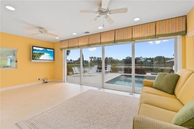 Enjoy natural light and serene views overlooking the lake, pool on Pipers Landing Country Club in Florida - for sale on GolfHomes.com, golf home, golf lot