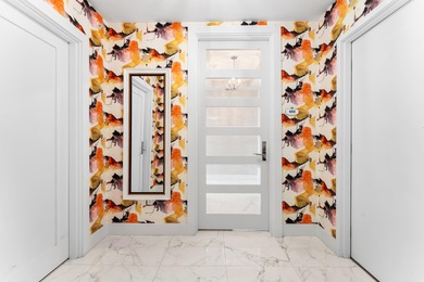 FULLY FURNISHED designer residence at Water Club with on Lost Tree Club in Florida - for sale on GolfHomes.com, golf home, golf lot