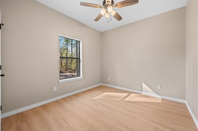 Discover modern East Texas living in this newly constructed on Rayburn Country Club in Texas - for sale on GolfHomes.com, golf home, golf lot