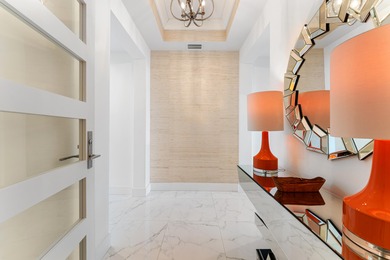 FULLY FURNISHED designer residence at Water Club with on Lost Tree Club in Florida - for sale on GolfHomes.com, golf home, golf lot