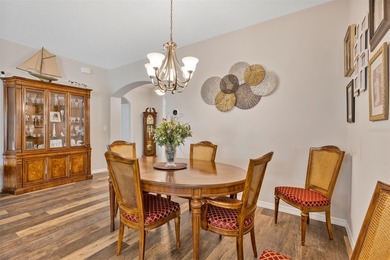 Welcome to a life that feels like vacation every day. Nestled in on Arlington Ridge Golf Club in Florida - for sale on GolfHomes.com, golf home, golf lot