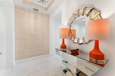 FULLY FURNISHED designer residence at Water Club with on Lost Tree Club in Florida - for sale on GolfHomes.com, golf home, golf lot