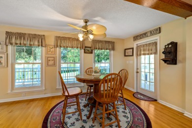 Welcome to this stunning 3-bedroom, 2.5-bathroom waterfront home on Players Course At Wyboo Plantation in South Carolina - for sale on GolfHomes.com, golf home, golf lot