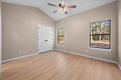 Discover modern East Texas living in this newly constructed on Rayburn Country Club in Texas - for sale on GolfHomes.com, golf home, golf lot