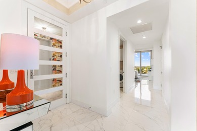 FULLY FURNISHED designer residence at Water Club with on Lost Tree Club in Florida - for sale on GolfHomes.com, golf home, golf lot