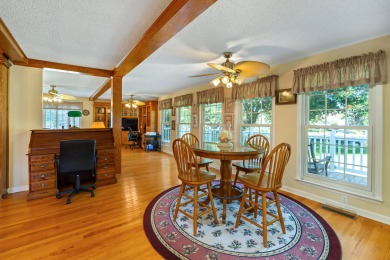 Welcome to this stunning 3-bedroom, 2.5-bathroom waterfront home on Players Course At Wyboo Plantation in South Carolina - for sale on GolfHomes.com, golf home, golf lot