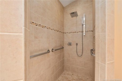 Enjoy natural light and serene views overlooking the lake, pool on Pipers Landing Country Club in Florida - for sale on GolfHomes.com, golf home, golf lot