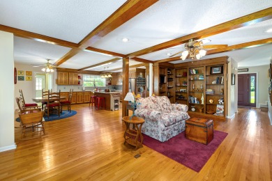 Welcome to this stunning 3-bedroom, 2.5-bathroom waterfront home on Players Course At Wyboo Plantation in South Carolina - for sale on GolfHomes.com, golf home, golf lot