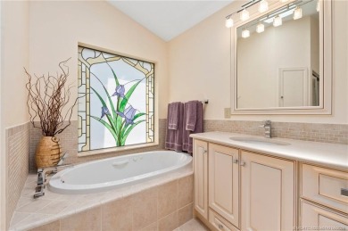 Enjoy natural light and serene views overlooking the lake, pool on Pipers Landing Country Club in Florida - for sale on GolfHomes.com, golf home, golf lot