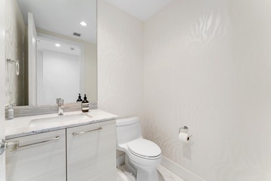 FULLY FURNISHED designer residence at Water Club with on Lost Tree Club in Florida - for sale on GolfHomes.com, golf home, golf lot