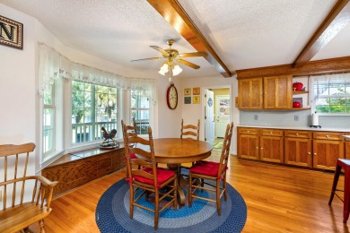 Welcome to this stunning 3-bedroom, 2.5-bathroom waterfront home on Players Course At Wyboo Plantation in South Carolina - for sale on GolfHomes.com, golf home, golf lot