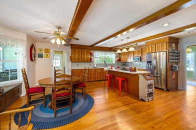 Welcome to this stunning 3-bedroom, 2.5-bathroom waterfront home on Players Course At Wyboo Plantation in South Carolina - for sale on GolfHomes.com, golf home, golf lot