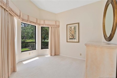 Enjoy natural light and serene views overlooking the lake, pool on Pipers Landing Country Club in Florida - for sale on GolfHomes.com, golf home, golf lot