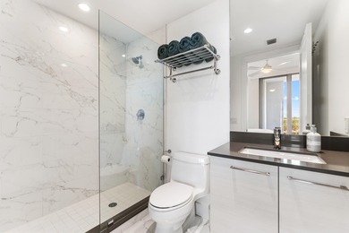 FULLY FURNISHED designer residence at Water Club with on Lost Tree Club in Florida - for sale on GolfHomes.com, golf home, golf lot