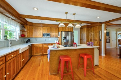 Welcome to this stunning 3-bedroom, 2.5-bathroom waterfront home on Players Course At Wyboo Plantation in South Carolina - for sale on GolfHomes.com, golf home, golf lot