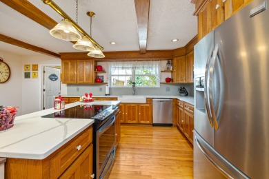 Welcome to this stunning 3-bedroom, 2.5-bathroom waterfront home on Players Course At Wyboo Plantation in South Carolina - for sale on GolfHomes.com, golf home, golf lot