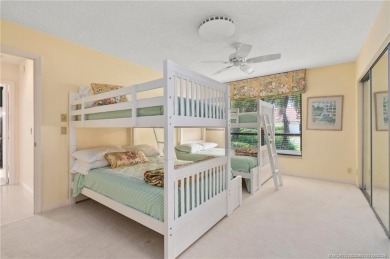 Enjoy natural light and serene views overlooking the lake, pool on Pipers Landing Country Club in Florida - for sale on GolfHomes.com, golf home, golf lot