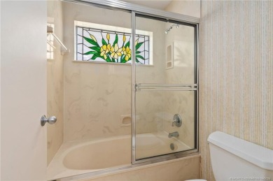 Enjoy natural light and serene views overlooking the lake, pool on Pipers Landing Country Club in Florida - for sale on GolfHomes.com, golf home, golf lot