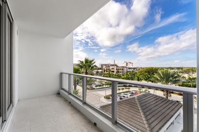 FULLY FURNISHED designer residence at Water Club with on Lost Tree Club in Florida - for sale on GolfHomes.com, golf home, golf lot