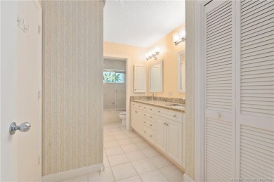 Enjoy natural light and serene views overlooking the lake, pool on Pipers Landing Country Club in Florida - for sale on GolfHomes.com, golf home, golf lot