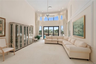 Enjoy natural light and serene views overlooking the lake, pool on Pipers Landing Country Club in Florida - for sale on GolfHomes.com, golf home, golf lot