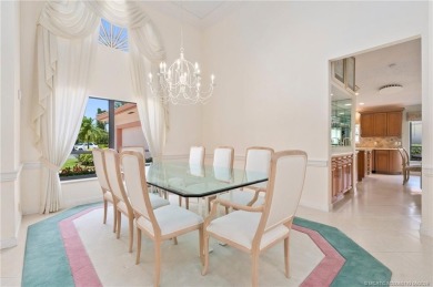 Enjoy natural light and serene views overlooking the lake, pool on Pipers Landing Country Club in Florida - for sale on GolfHomes.com, golf home, golf lot