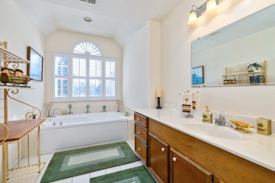 Welcome to this stunning 3-bedroom, 2.5-bathroom waterfront home on Players Course At Wyboo Plantation in South Carolina - for sale on GolfHomes.com, golf home, golf lot