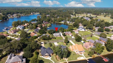 Welcome to this stunning 3-bedroom, 2.5-bathroom waterfront home on Players Course At Wyboo Plantation in South Carolina - for sale on GolfHomes.com, golf home, golf lot