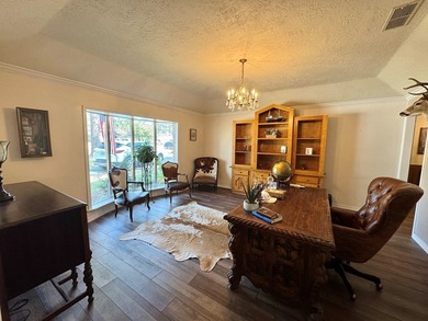 Situated in the heart of Rayburn Country, this elegant golf on Rayburn Country Club in Texas - for sale on GolfHomes.com, golf home, golf lot