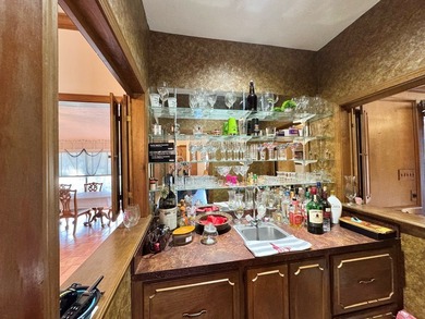 Situated in the heart of Rayburn Country, this elegant golf on Rayburn Country Club in Texas - for sale on GolfHomes.com, golf home, golf lot