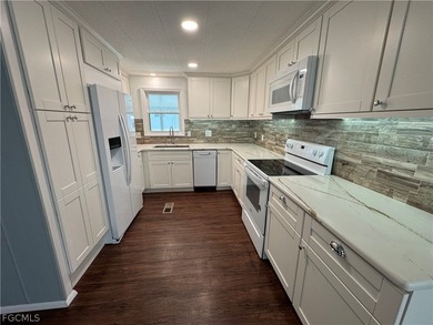 Own the Land in Naples! Home needs flooring and shower repairs on Riviera Golf Club in Florida - for sale on GolfHomes.com, golf home, golf lot