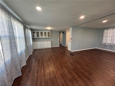 Own the Land in Naples! Home needs flooring and shower repairs on Riviera Golf Club in Florida - for sale on GolfHomes.com, golf home, golf lot