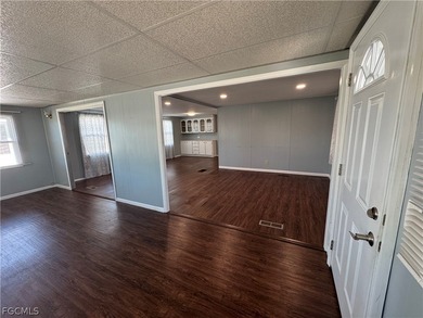 Own the Land in Naples! Home needs flooring and shower repairs on Riviera Golf Club in Florida - for sale on GolfHomes.com, golf home, golf lot