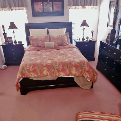 Maintenance free living. This two-bedroom, two-bath villa with a on Timber Greens Country Club in Florida - for sale on GolfHomes.com, golf home, golf lot