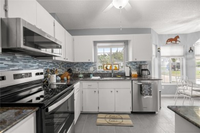 Welcome to this beautifully maintained 2-bedroom, 2-bathroom on Ocala Palms Golf and Country Club in Florida - for sale on GolfHomes.com, golf home, golf lot